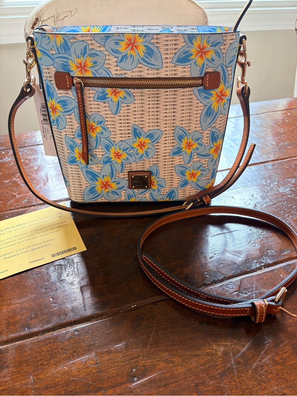 Dooney & Bourke Plumeria Blue Floral and Brown Leather Crossbody